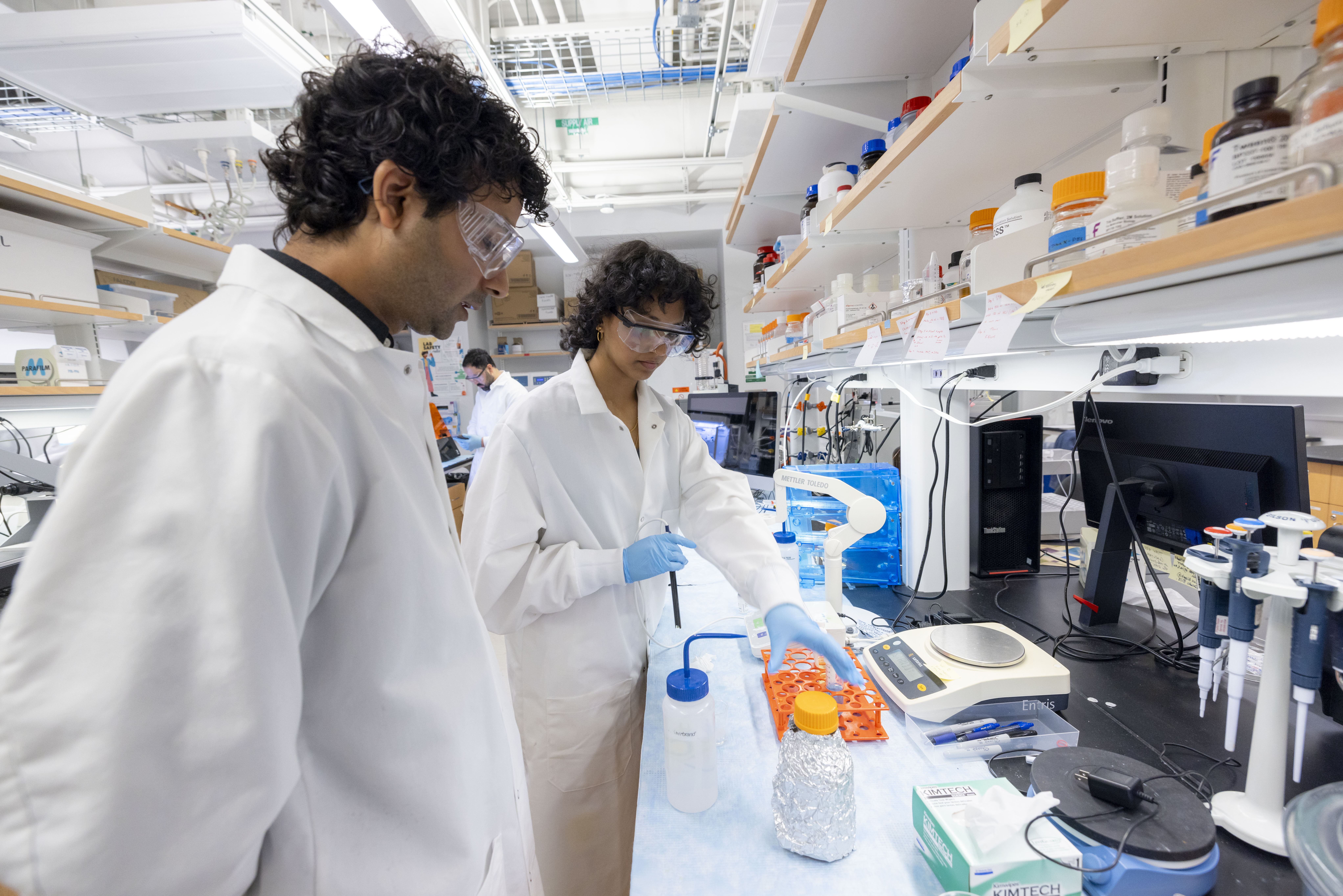 Dr. Indranath Mitra and Ananya Gomatam at work in the Ba.M.M. Lab. (Photo by Timothy Sofranko)