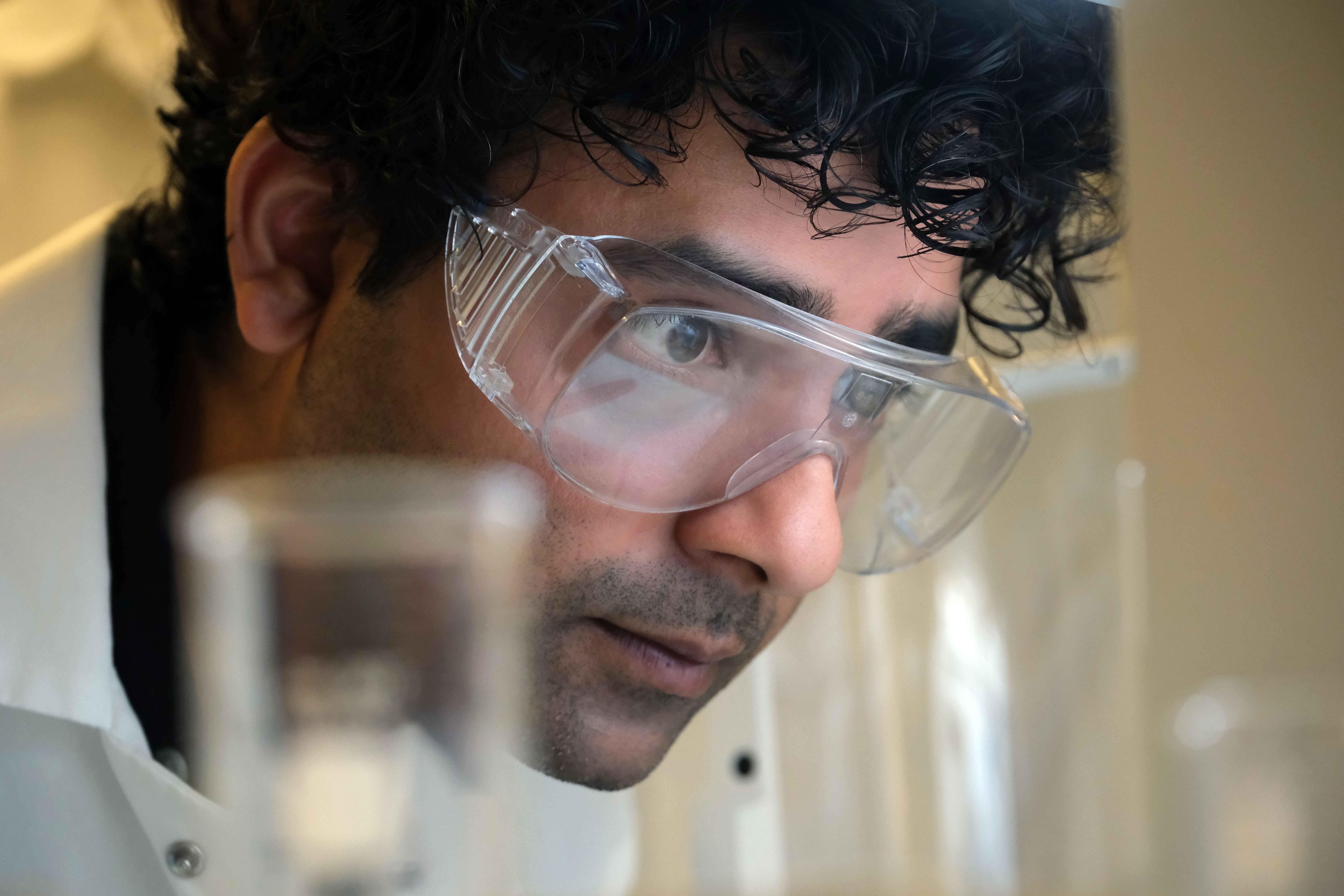 Dr. Indranath Mitra at work in the Ba.M.M. Lab. (Photo by Timothy Sofranko)